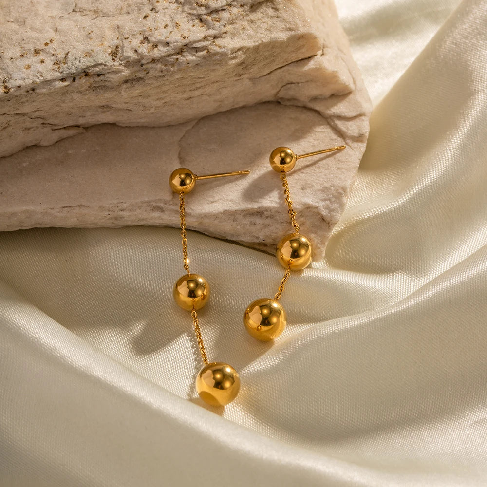 BowLift | Dangle Gold Bead Tassel Earrings