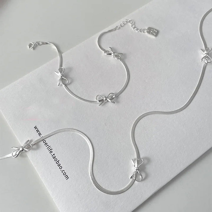 BowLift | Feminine Bow Herringbone Necklace and Bracelet