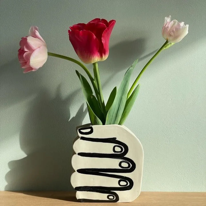 Hand Holding Flowers Vase | Bowlift