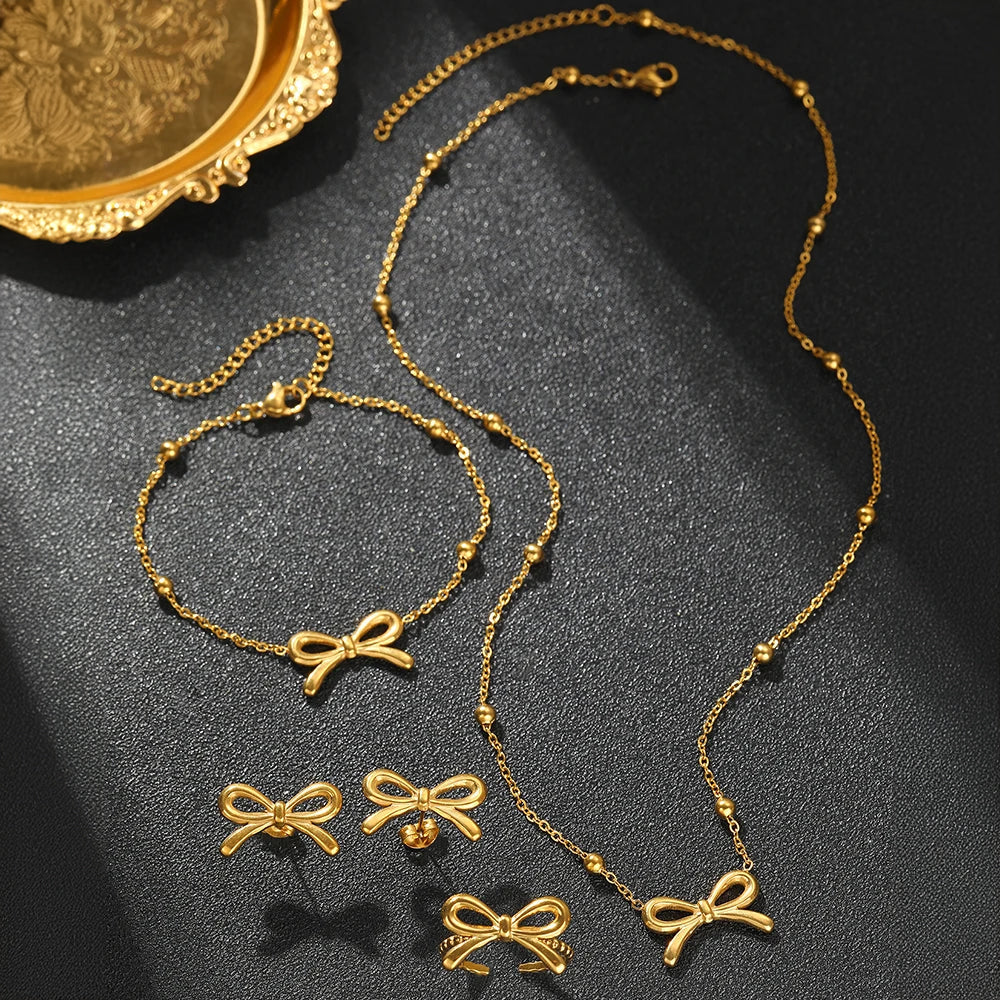 BowLift | Feminine Bow Satellite Chain Necklace, Bracelet, Earrings, and Ring Set