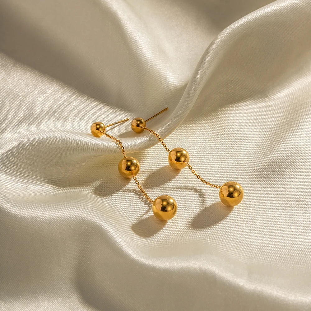BowLift | Dangle Gold Bead Tassel Earrings
