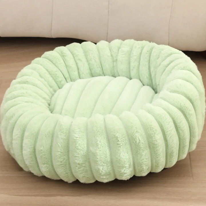 Round donut dog bed made of plush with non-slip bottom Bowlift
