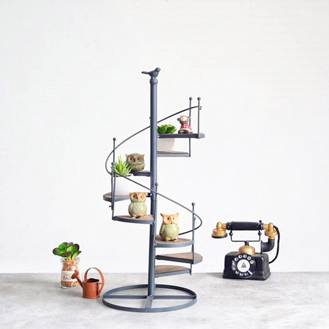 Elegant spiral-shaped plant stand for balcony and garden arrangements Bowlift