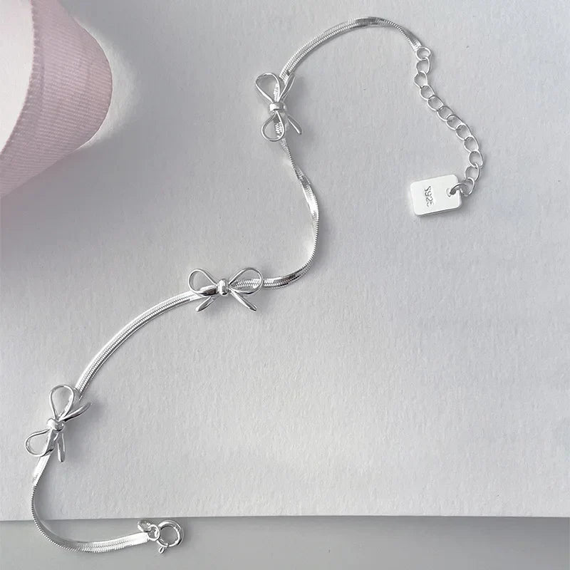 BowLift | Feminine Bow Herringbone Necklace and Bracelet