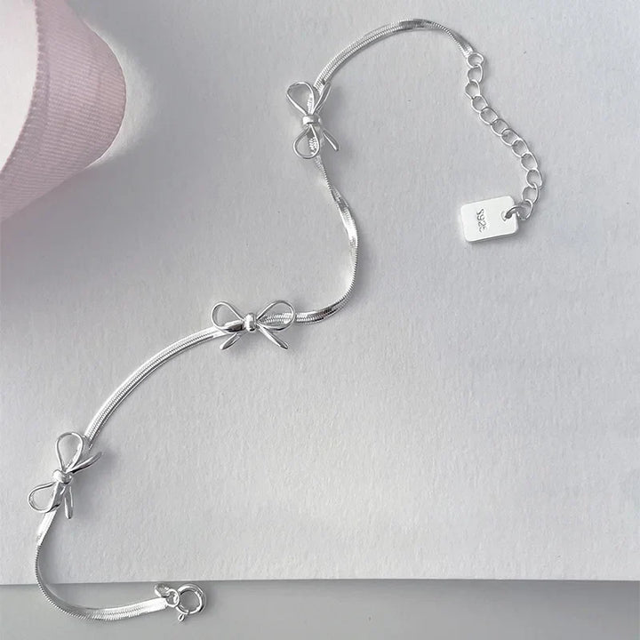 BowLift | Feminine Bow Herringbone Necklace and Bracelet