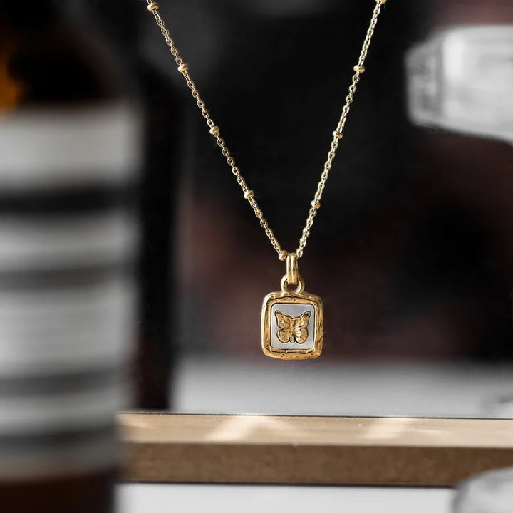 BowLift | Feminine Gold Accented Butterfly Square Pendant Necklace