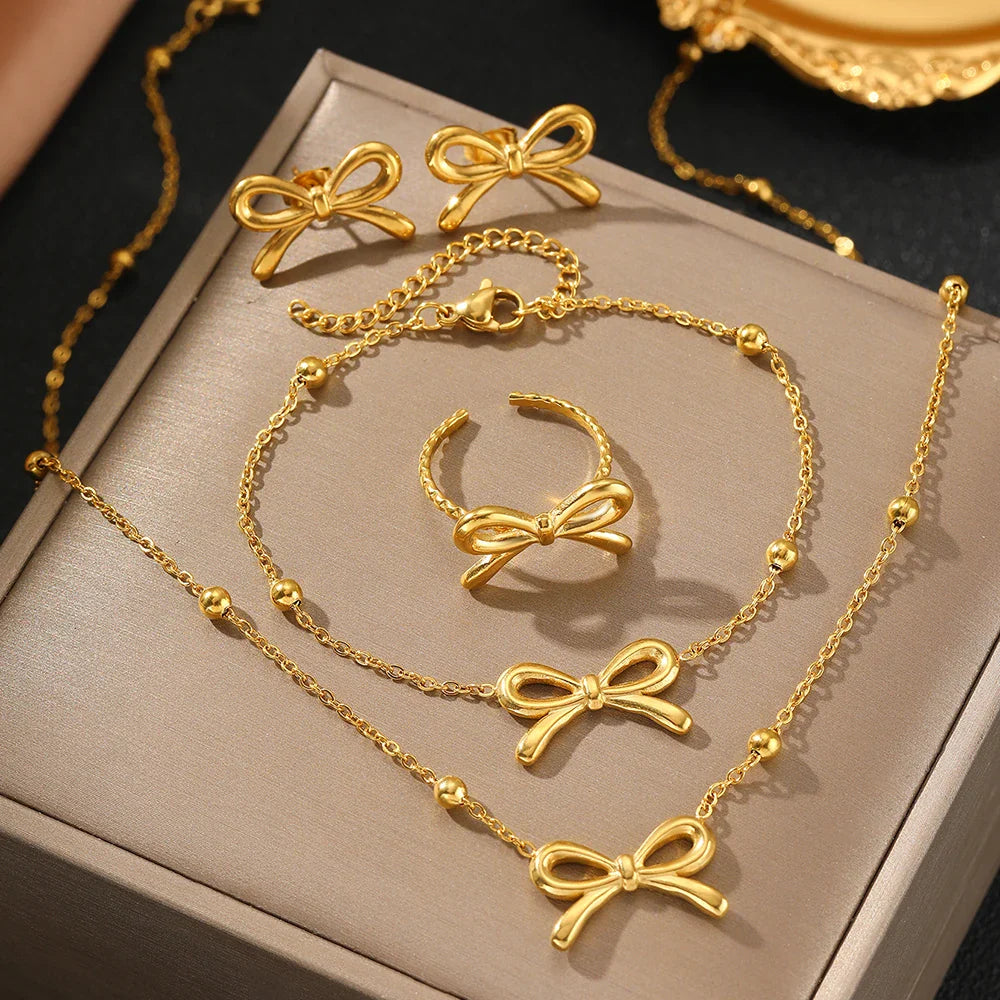 BowLift | Feminine Bow Satellite Chain Necklace, Bracelet, Earrings, and Ring Set