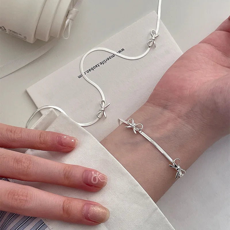 BowLift | Feminine Bow Herringbone Necklace and Bracelet