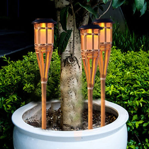 Solar-powered garden torches in bamboo design – Weatherproof LED decorative lighting for outdoors | Bowlift