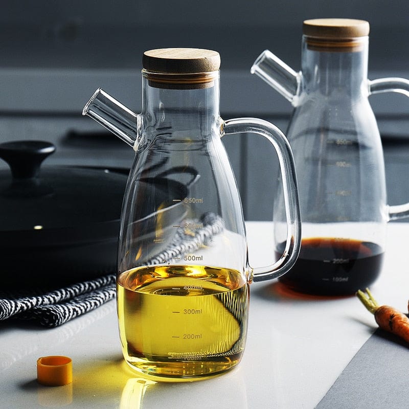 Transparent glass oil bottle with handle Bowlift
