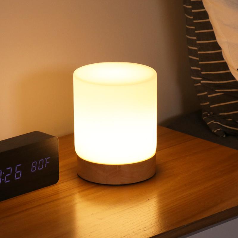 BowLift | Minimalistic table lamp with touch function and 360° lighting