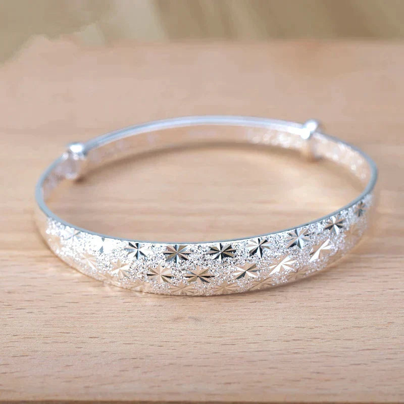 Enchanting Star-Shaped Silver Bracelet for a Radiant Look Bowlift