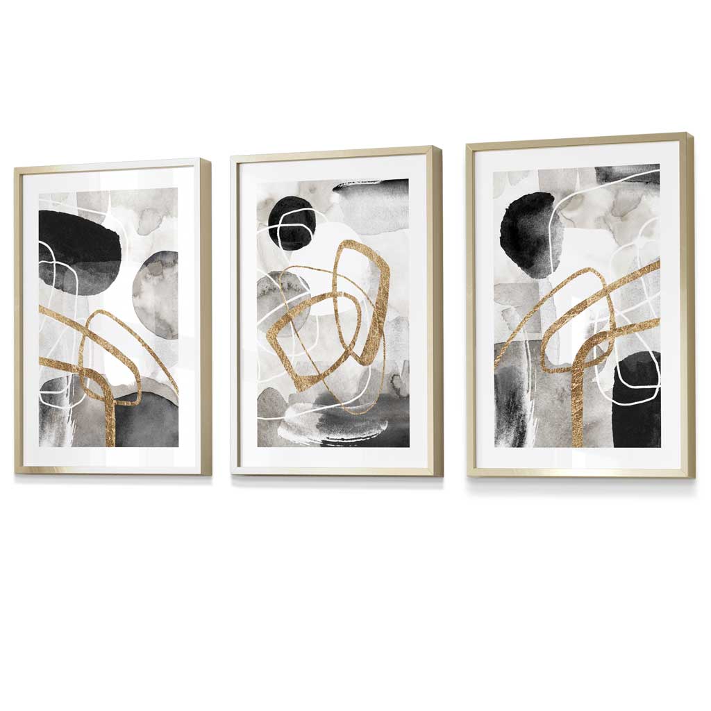Abstract black, gray, and gold shapes set of 3 framed wall art prints | Bowlift