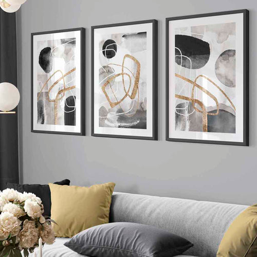 Abstract black, gray, and gold shapes set of 3 framed wall art prints | Bowlift