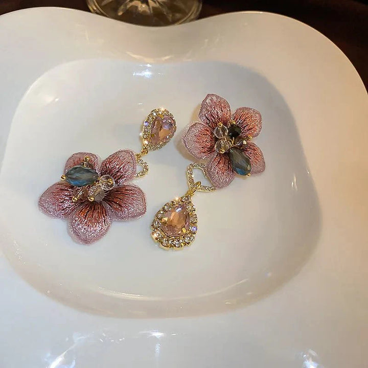 BowLift | Asymmetrical Oriental Hibiscus Crystal Earrings