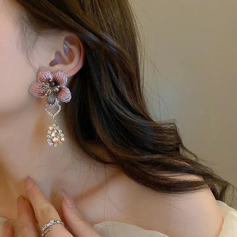 BowLift | Asymmetrical Oriental Hibiscus Crystal Earrings