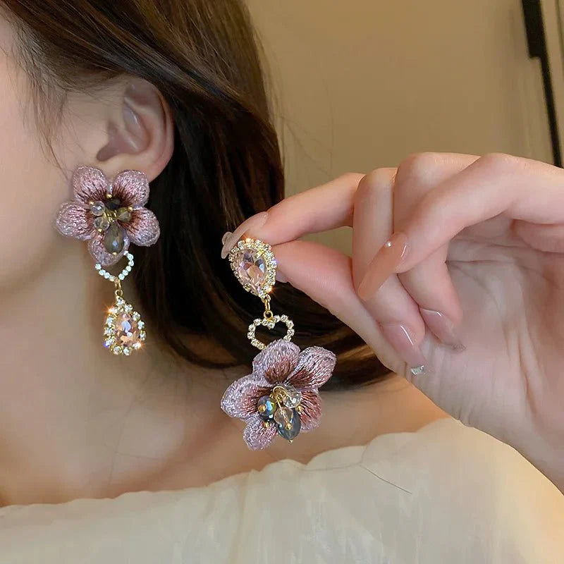BowLift | Asymmetrical Oriental Hibiscus Crystal Earrings
