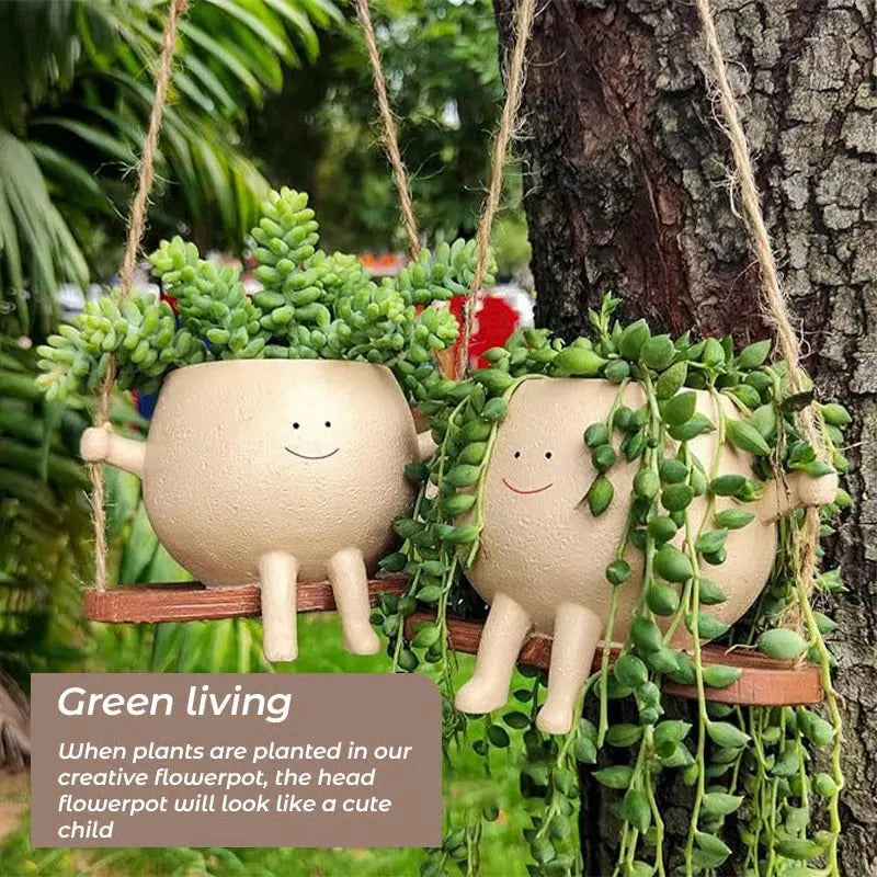 BowLift | Hanging planter with smiling face