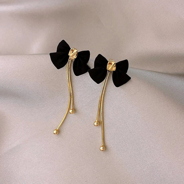 BowLift | Dainty Bow Gold Dangle Earrings