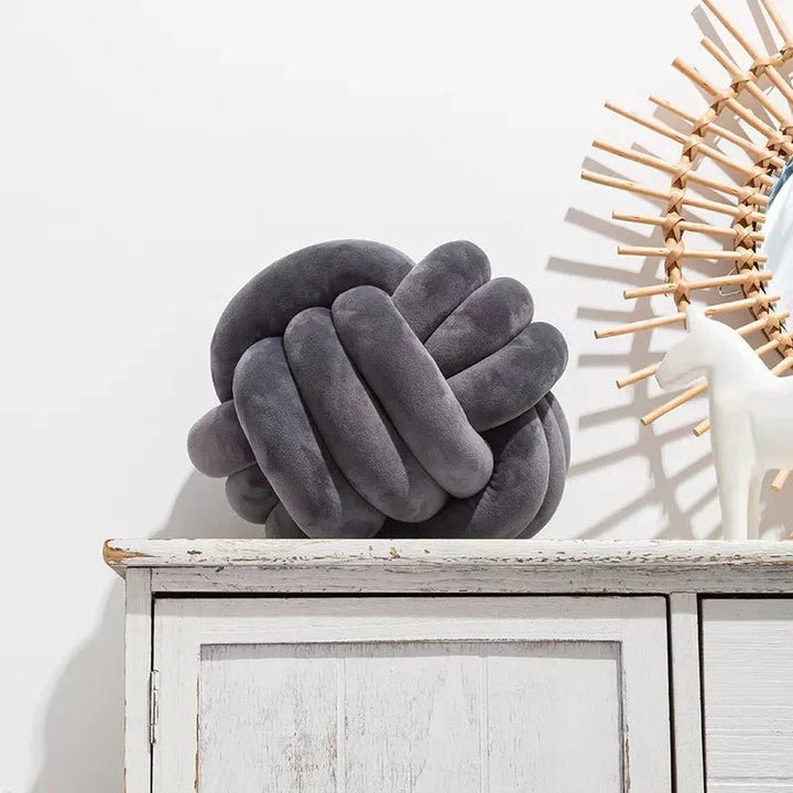 BowLift | Decorative knotted suede-look ball soft cushion