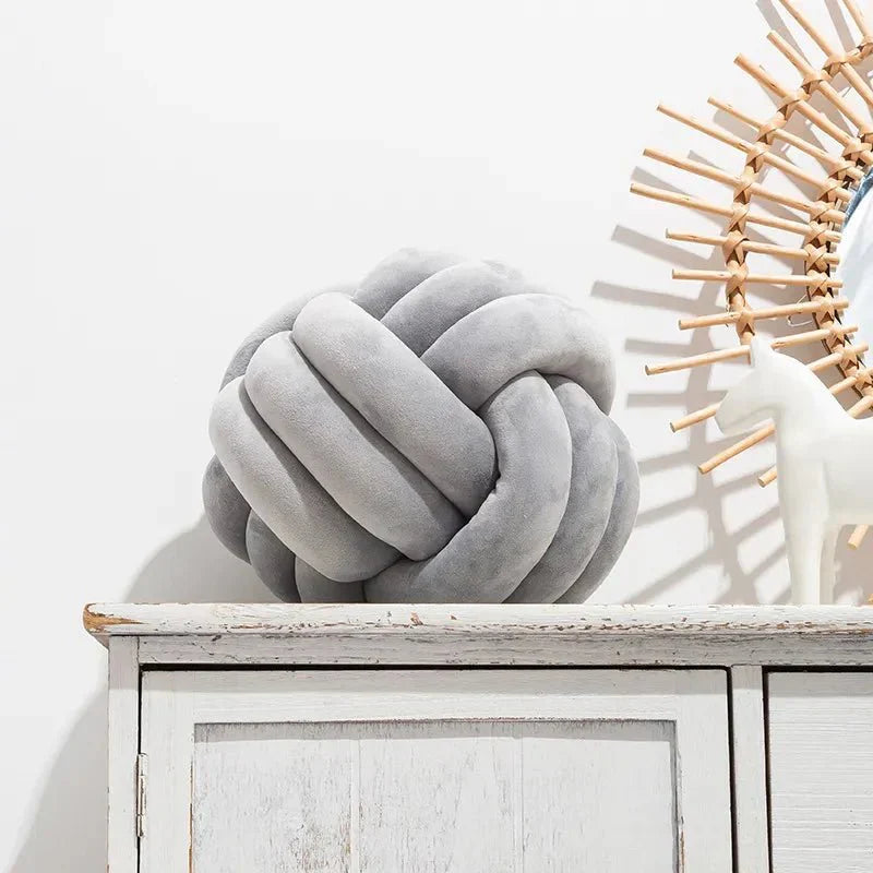 BowLift | Decorative, soft cushion with knotted ball in suede look