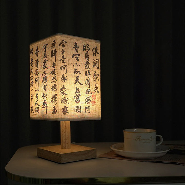 LED table lamp in a square design – wooden base with Japanese pattern | Bowlift