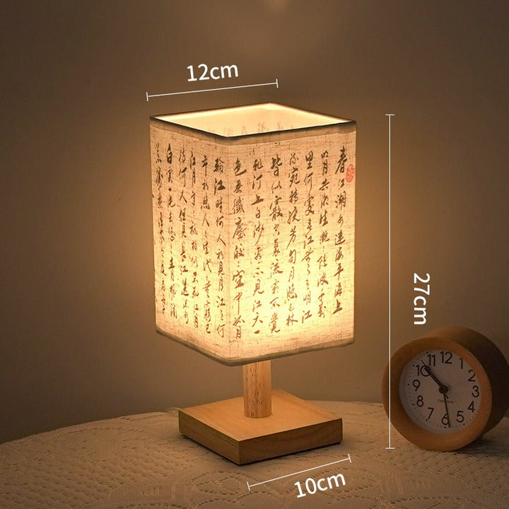 LED table lamp in a square design – wooden base with Japanese pattern | Bowlift