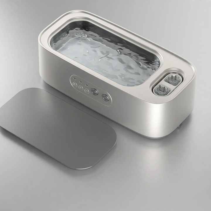 Ultrasonic cleaning device, portable, double chamber