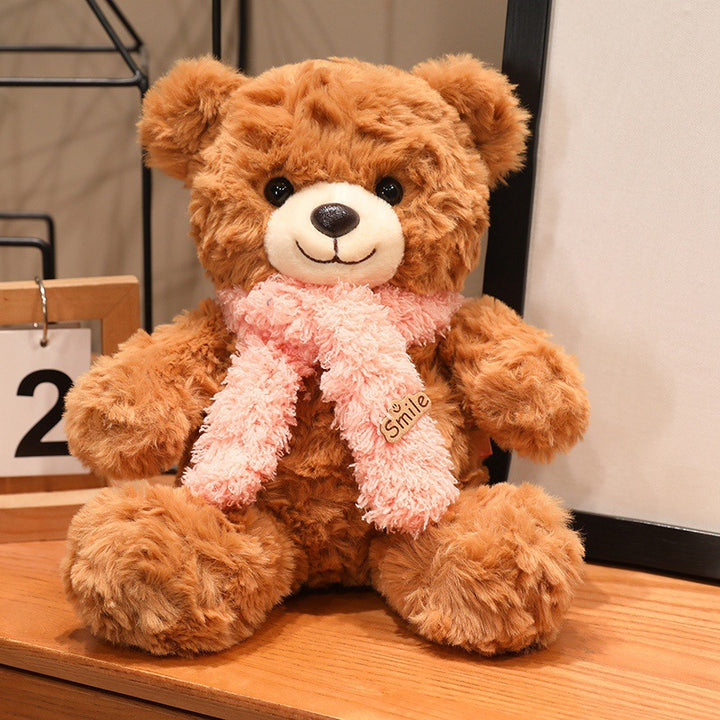 Large plush teddy bear with silk ribbon