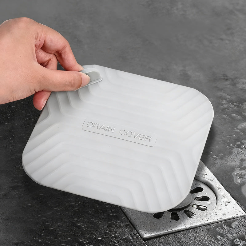 Silicone floor drain seal, odor-reducing