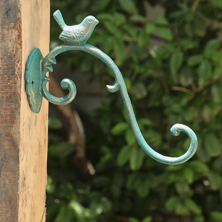 Cast iron wall hook with bird motif