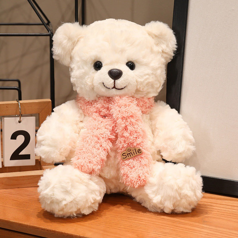 Large plush teddy bear with silk ribbon