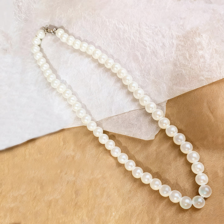 Pearl necklace with silver clasp, pearls 4–12 mm