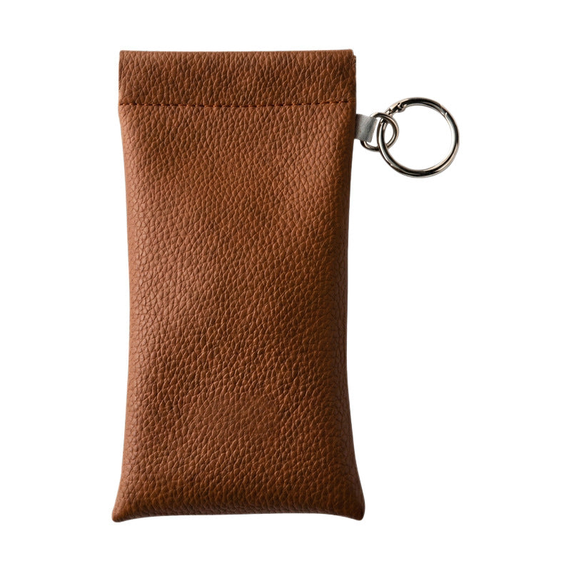 Leather glasses case with cleaning cloth and hangtag