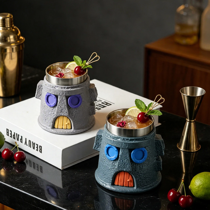 Stainless steel drinking glass with castle design