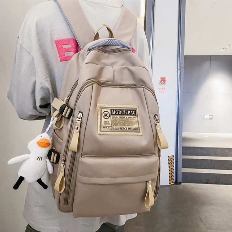 Double-shoulder backpack for students and pupils