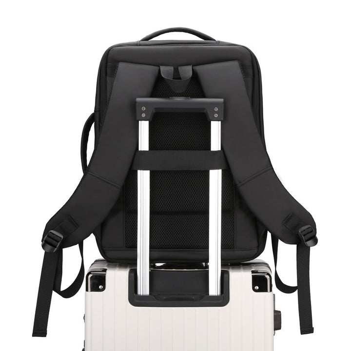 Expandable business backpack with USB charging, 20-35 L