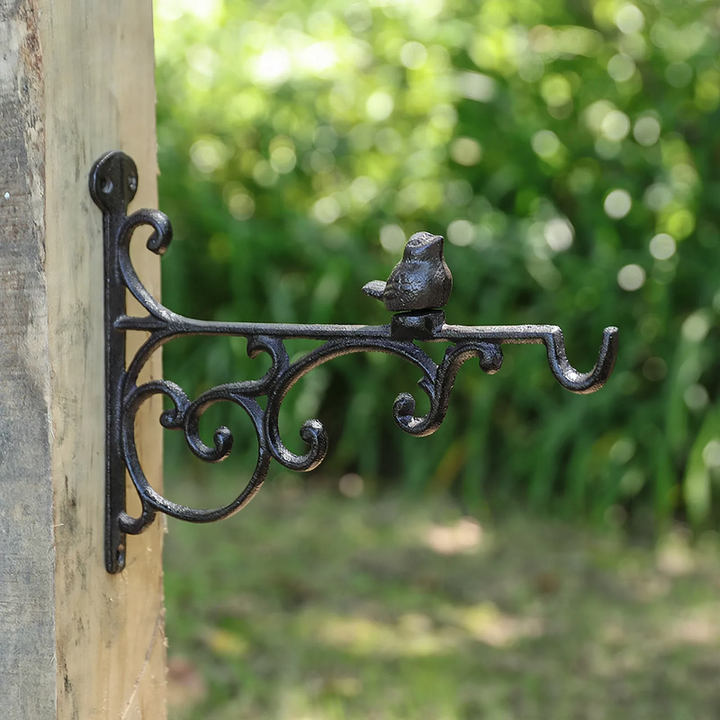 Cast iron wall hook with bird motif