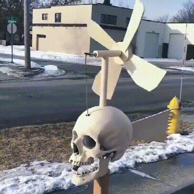 BowLift | Iron Skull Whirligig - Garden Decor