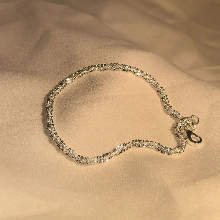 SilverFlow Bracelet – Elegant Sterling Silver Bracelet Bowlift