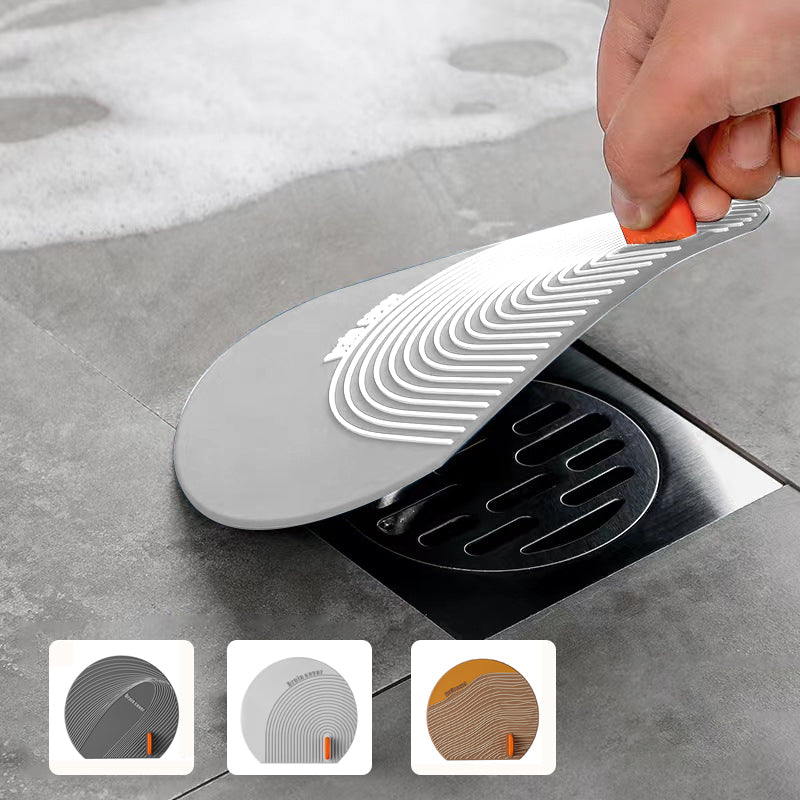 BowLift | Multi-purpose floor drain cover made of silicone