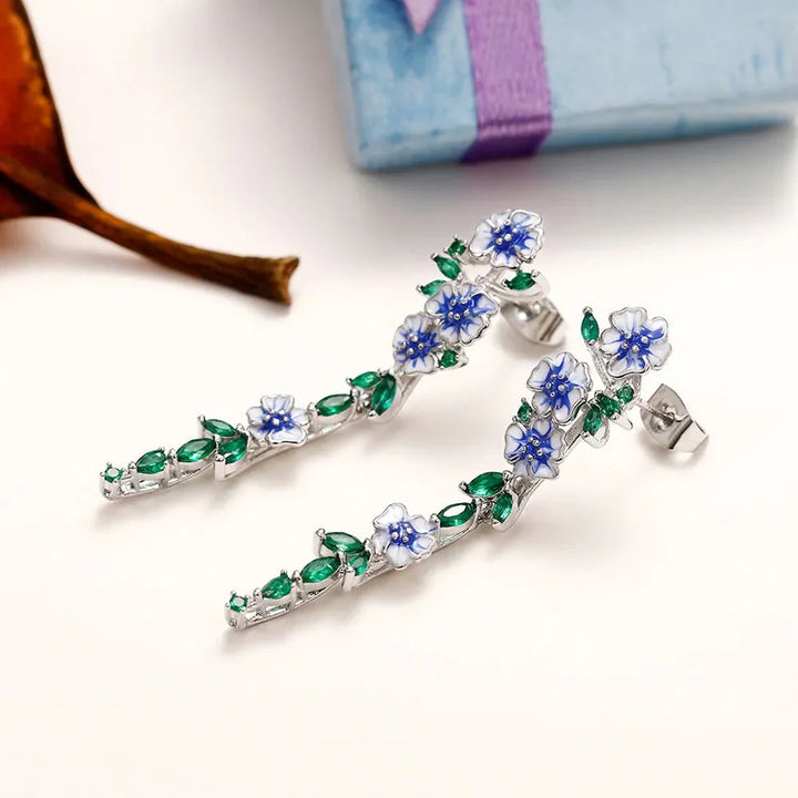 BowLift | Glossy Blue Floral Dangling Earrings