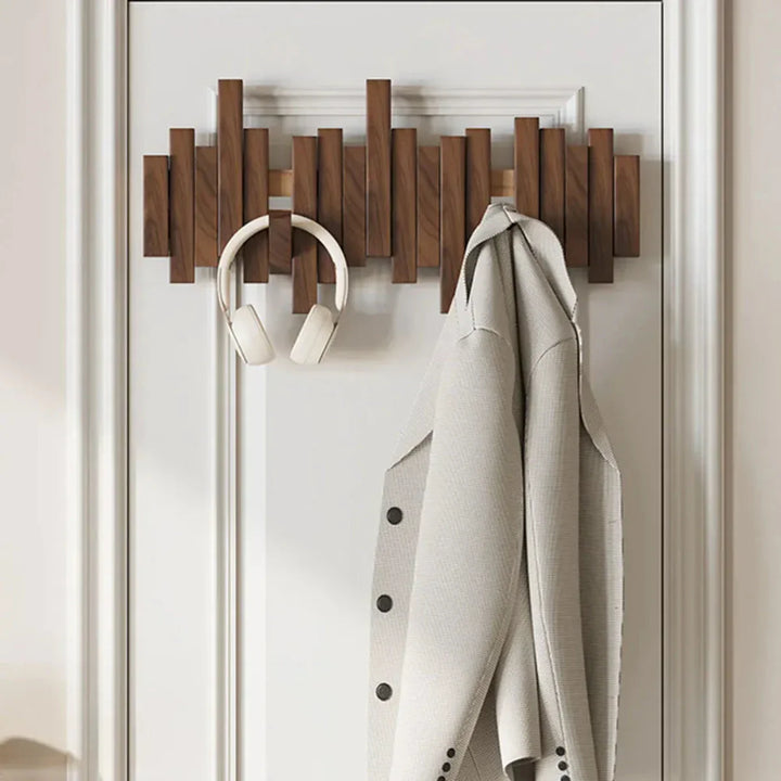 BowLift | Modern piano-style hanger made of walnut and beech wood