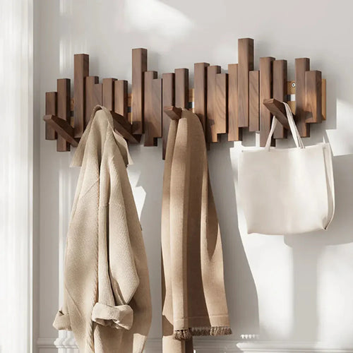 BowLift | Modern piano-style hanger made of walnut and beech wood