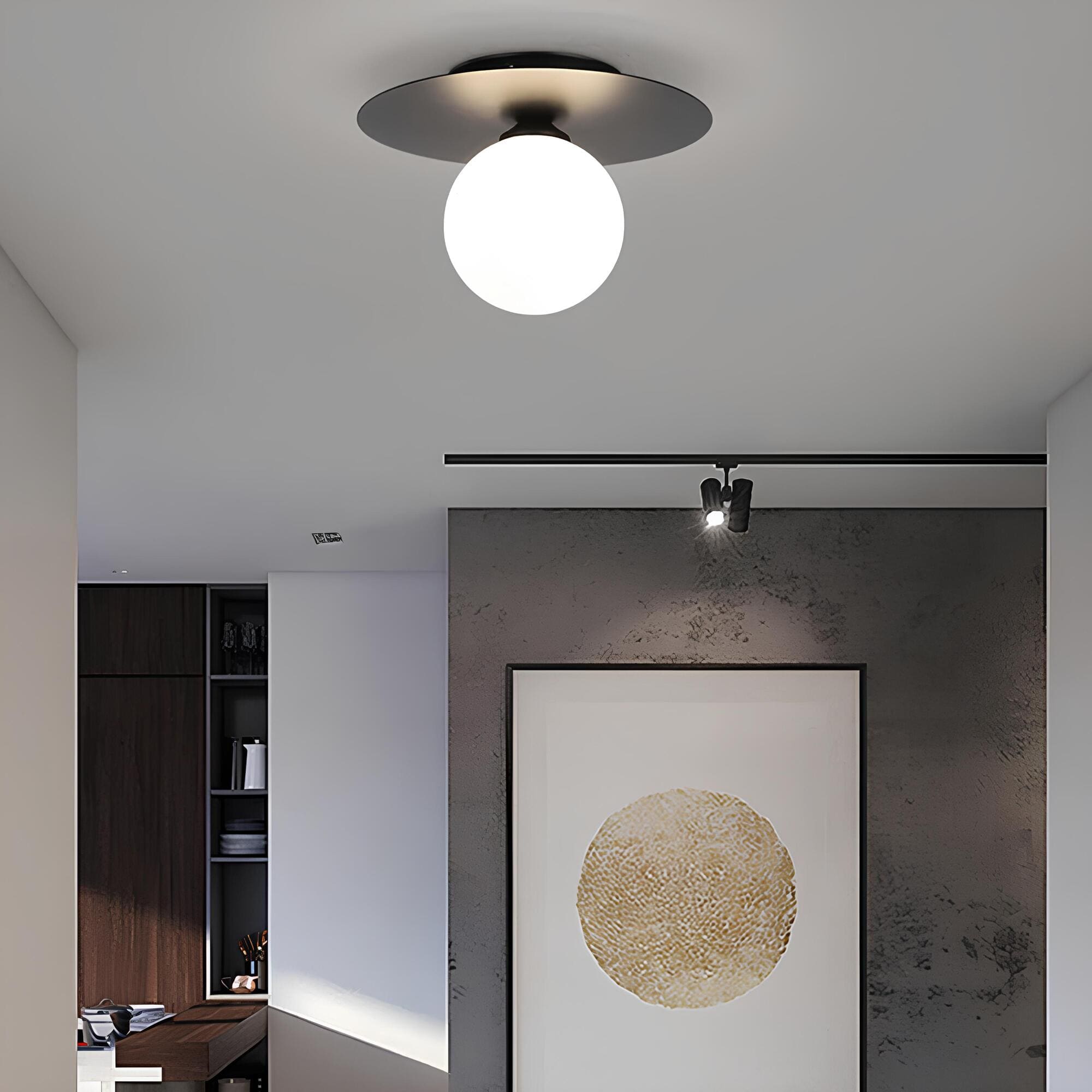 BowLift | LumiNoble | Timeless ceiling light with golden LED ball design
