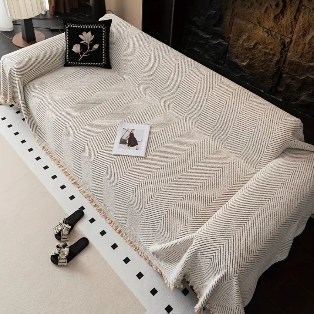 BowLift | CUSHVIVE – Herringbone Sofa Cover with Splash Protection and Non-Slip Design
