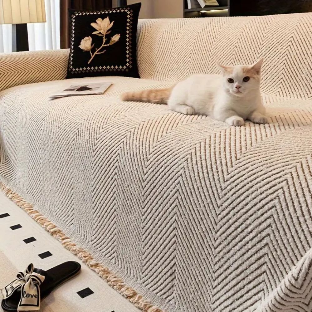 BowLift | CUSHVIVE – Herringbone Sofa Cover with Splash Protection and Non-Slip Design