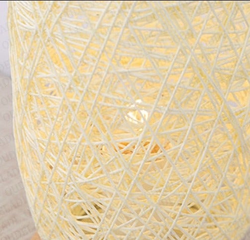 BowLift | Table lamp made of rattan wood