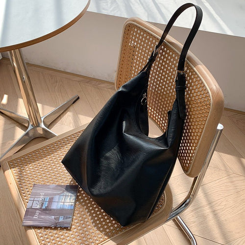 BowLift | PUFFYPOUCH – Soft PU Leather Dumpling Tote for a Playful, Chic Look