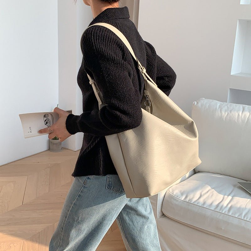 BowLift | PUFFYPOUCH – Soft PU Leather Dumpling Tote for a Playful, Chic Look